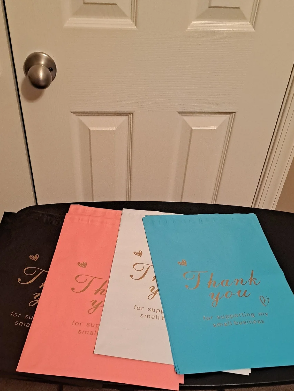16 ct - Blue, Coral, White and Black 10x13 polymailers. Four of each color.